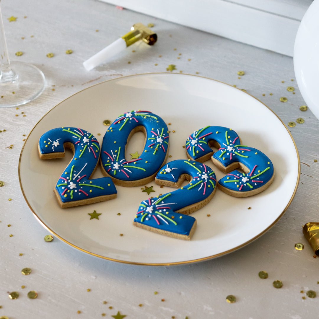 New Year 2023 Biscuiteers gift box with hand-iced biscuits, perfect for employee appreciation and festive celebrations.