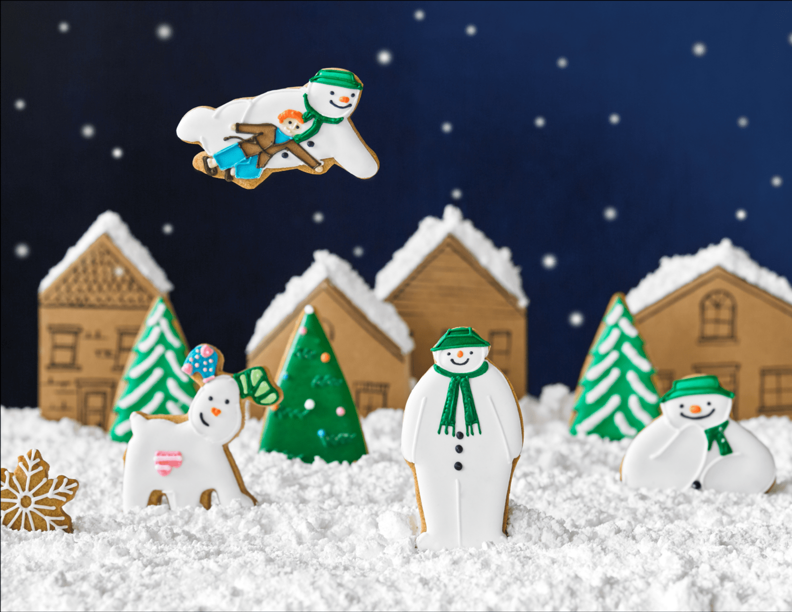 Hand-iced snowman biscuit by Biscuiteers, perfect for Christmas gifts and personalized festive treats.