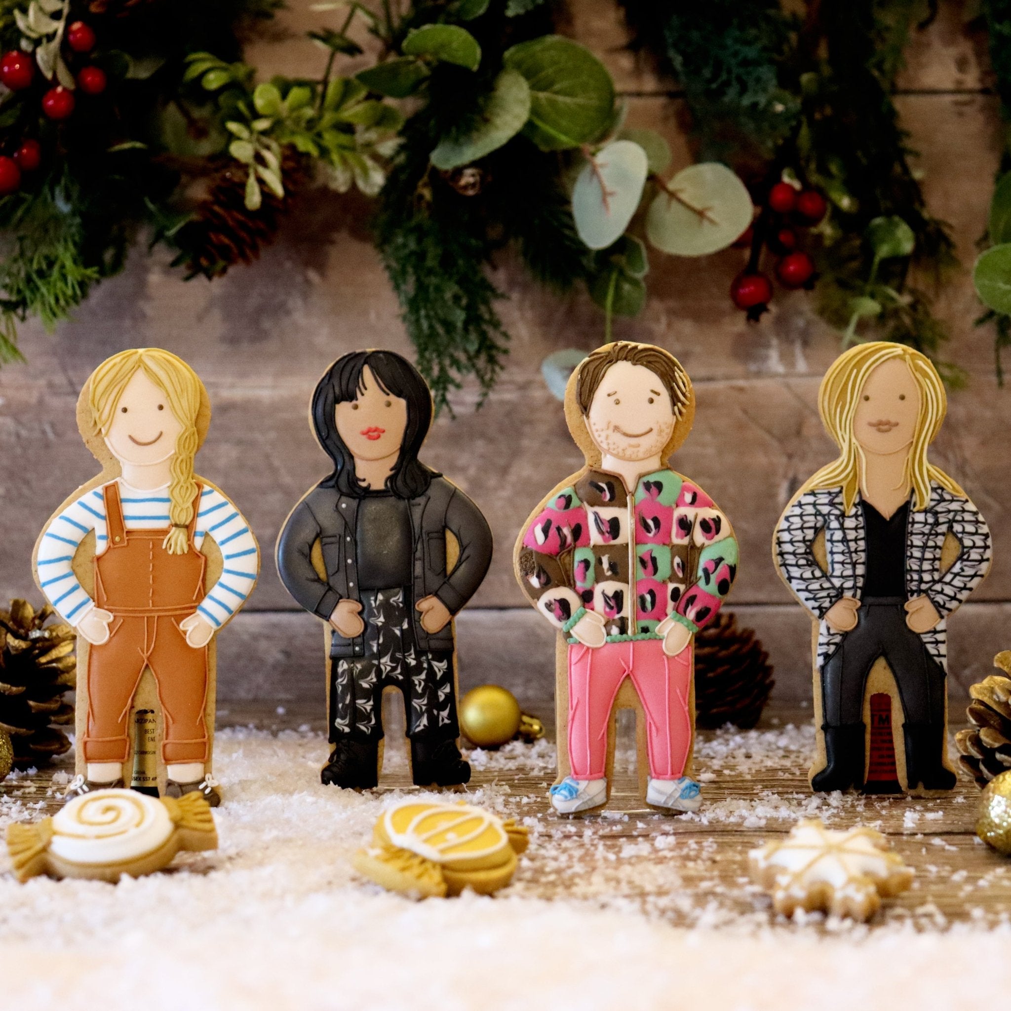 Biscuiteers Elves busy preparing Christmas biscuits, icing bags filled, and gifts packed for festive personalized gifts delivery.