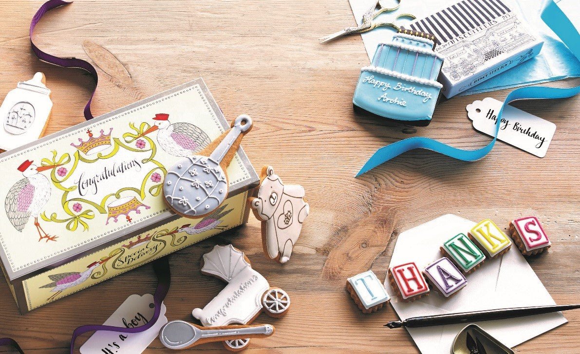 Mention Me and Biscuiteers partnership; personalized gifting with hand-iced biscuits for client acquisition and retention.