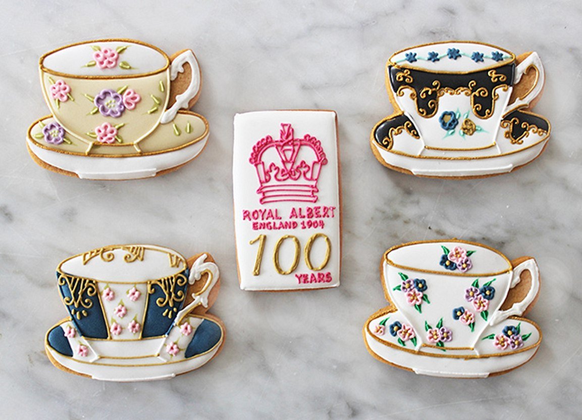 Royal Albert teacup biscuits by Biscuiteers for #100YearsofTea campaign, perfect for personalised gifts and celebrations.
