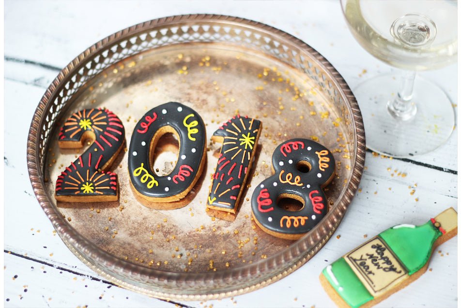 New Year Biscuit Box by Biscuiteers: festive hand-illustrated gift box with personalized iced biscuits for celebrations.