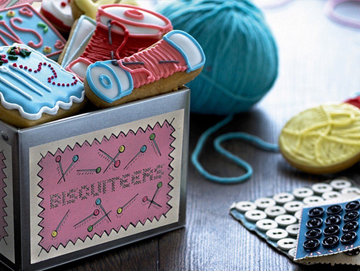 Mother's Day biscuit collection with colorful icing, perfect for personalized gifts by Biscuiteers. Celebrate with creativity!