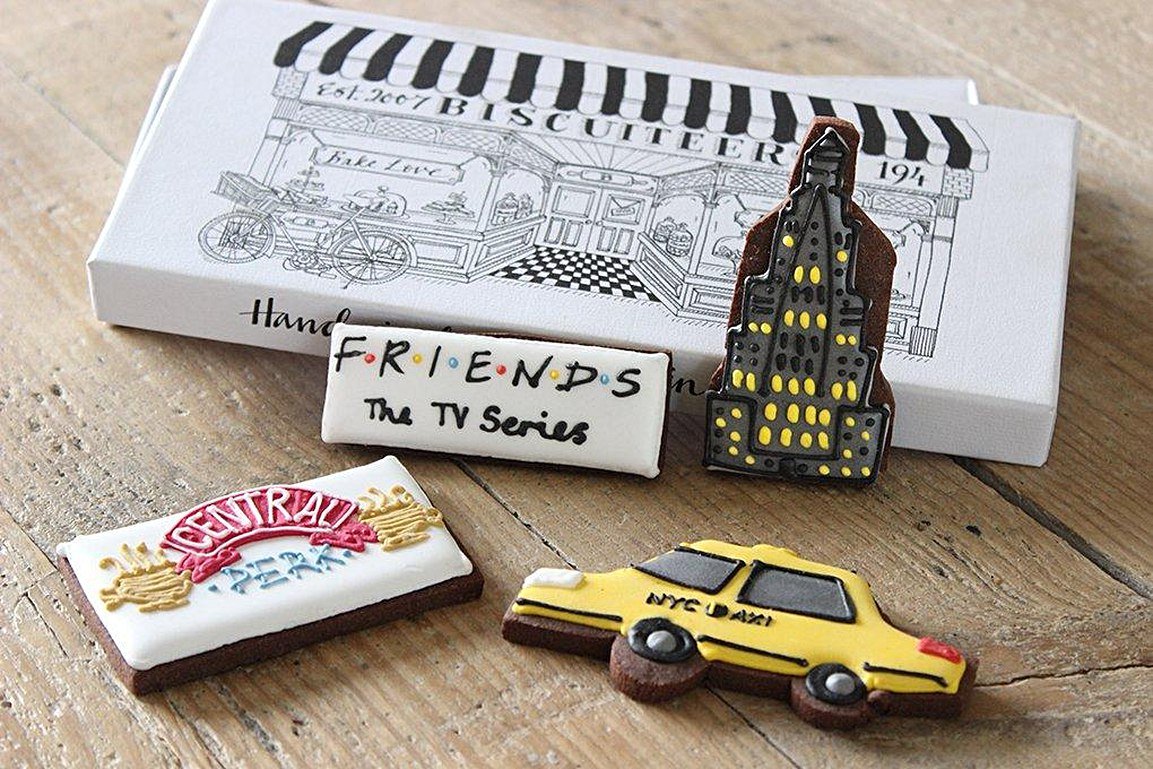 London skyline window display with Friends anniversary biscuits by Biscuiteers, perfect for personalized gifts and celebrations.