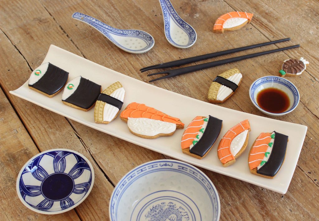 Biscuiteers Bento Sushi box with salmon sashimi and seaweed flavored biscuits, perfect for personalized gifts and events.