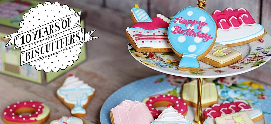 Biscuiteers 10th anniversary celebration with colorful iced biscuits, perfect for thoughtful, personalized gifts.