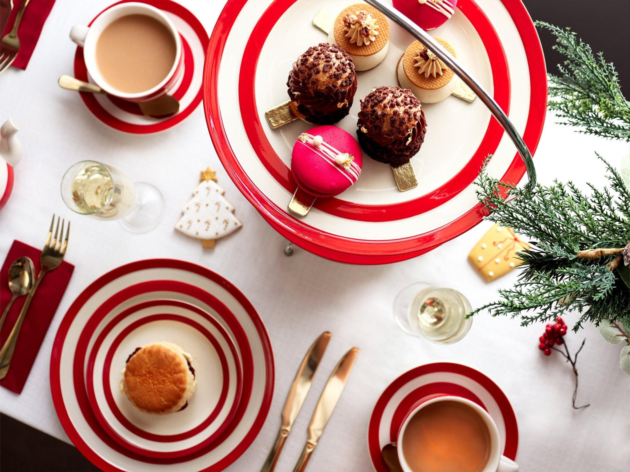 Festive Biscuiteers Christmas biscuits in a decorative tin, perfect for personalized gifts and seasonal celebrations in London.