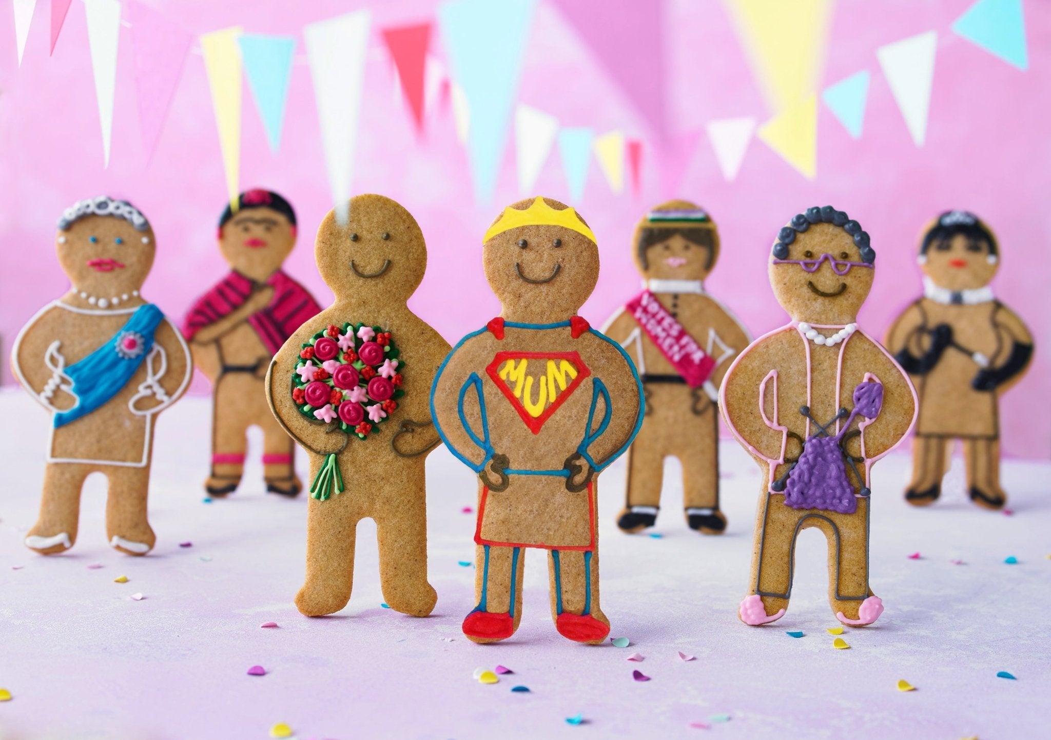 International Women's Day Biscuiteers Jolly Gingers: Emmeline Pankhurst, Frida Kahlo, Audrey Hepburn, Super Mum biscuits.