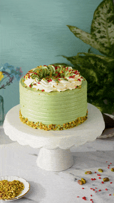 Patisserie Valerie Pistachio and Raspberry Delight Cake - Biscuiteers