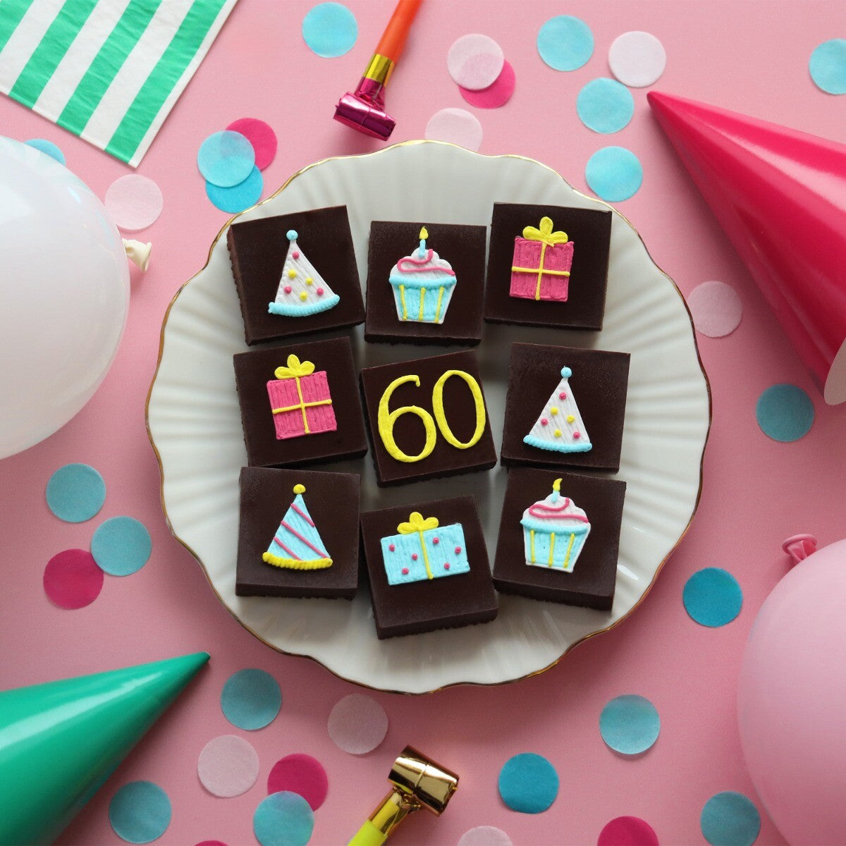 Hand-iced Gingerman Jolly Ginger biscuit, perfect personalised birthday gift, from Biscuiteers.