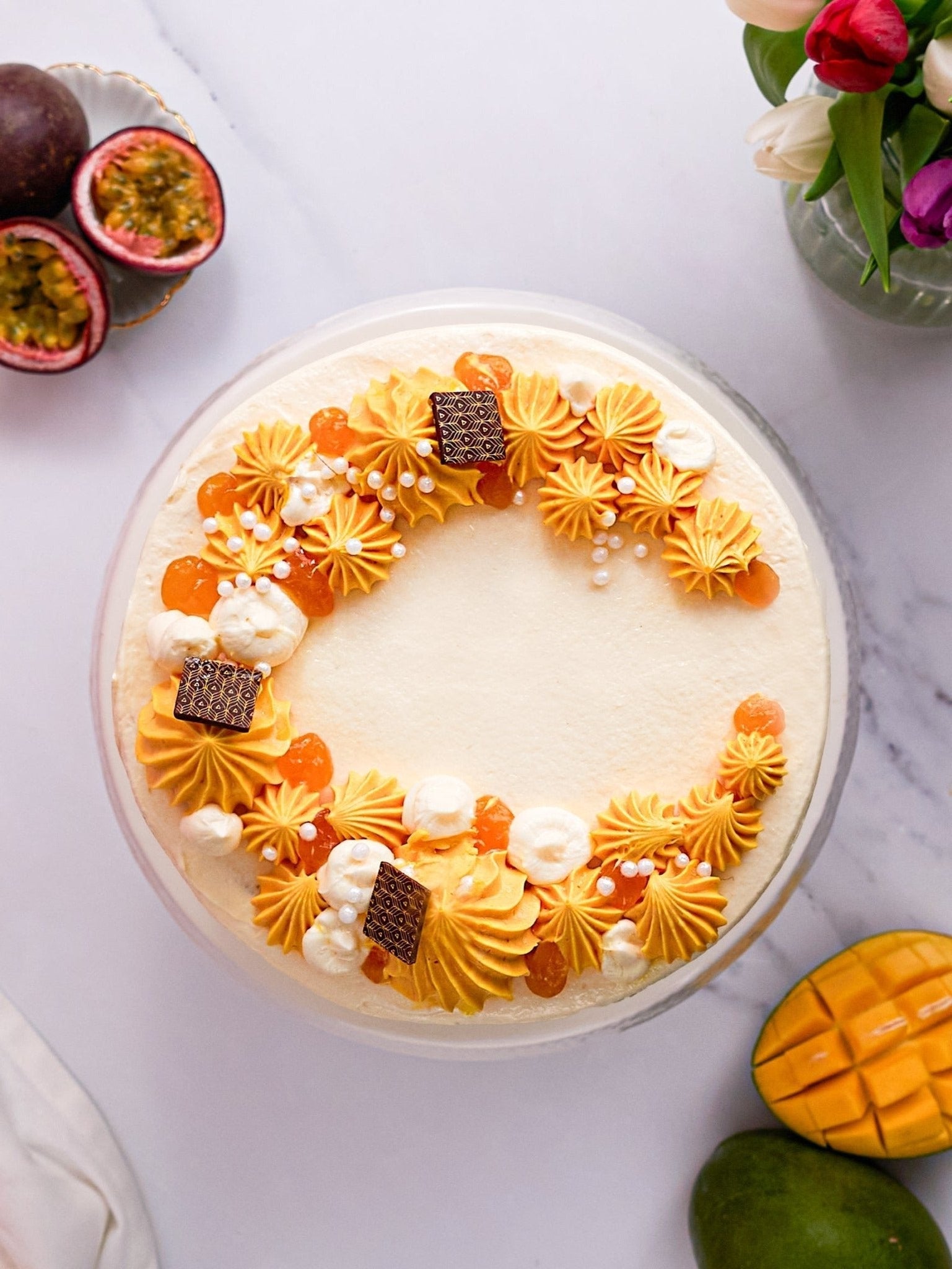 Patisserie Valerie Mango & Passionfruit Cake - Biscuiteers