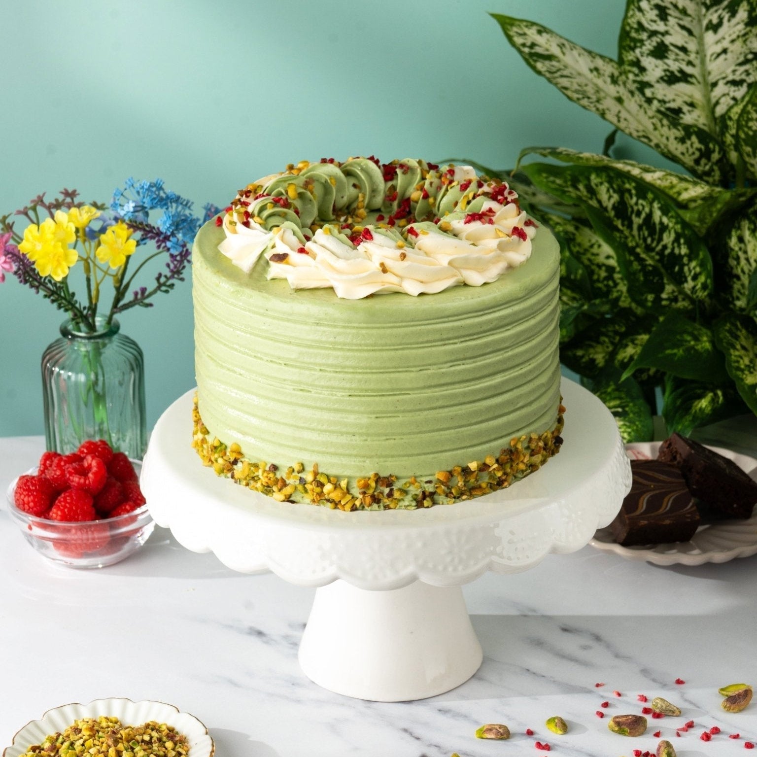 Patisserie Valerie Pistachio and Raspberry Delight Cake - Biscuiteers